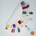 Load image into Gallery viewer, Molehill taggie white baby blanket side shower gift